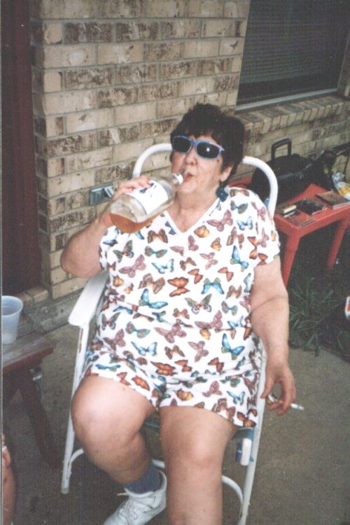 White Trash Mama smoking and drinking