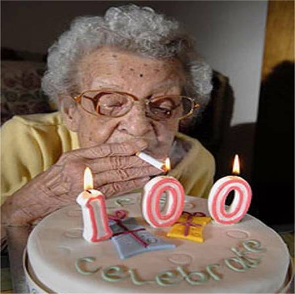 Old woman smoker 100th birthday cake candles